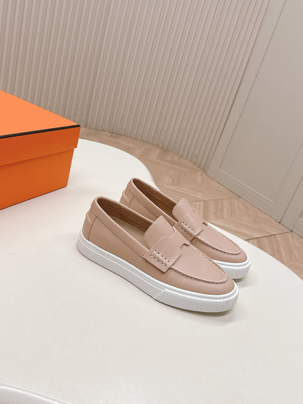 HERMES 25S SLIP-ON IN SOFT NUDE PINK LAMBSKIN